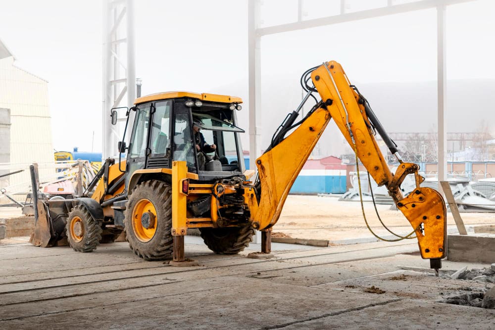 How does having a backhoe hammer help your excavator